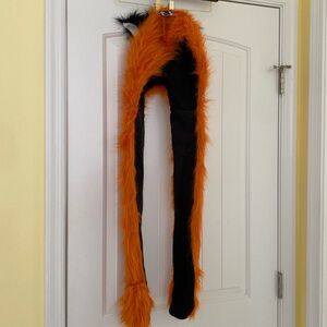 Fun animal hat with built in mittens.